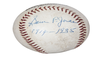 a baseball with Sam P Jones written on it and the date 1914-1935
